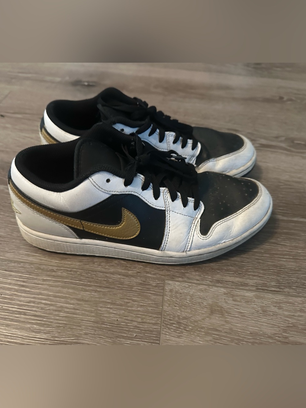 Air Jordan 1 Low Top  Nike Low-Top Sneakers in Black, White & Gold Swoosh
